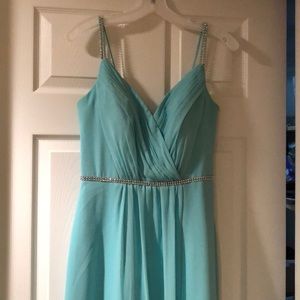 A beautiful minty green long prom gown
